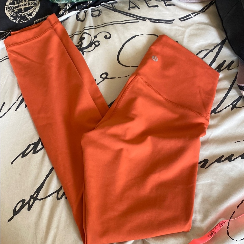 Lululemon Brick colored Leggings (red orange)